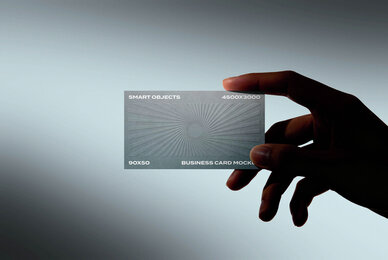 Business Card in Hand Mockup