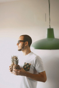 man with pineapple