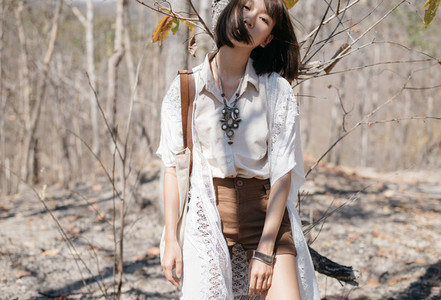 Young pretty girl in forest 01