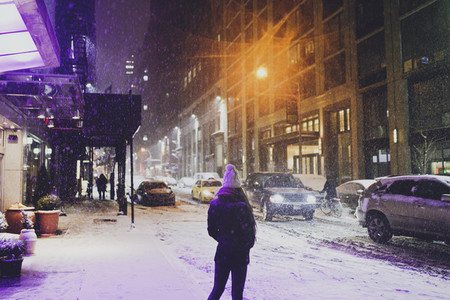 Girl standing in NYC snow