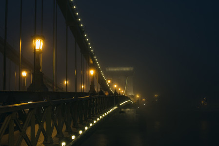 Chain Bridge in Budapest  Hungary  the fog  evening lights
