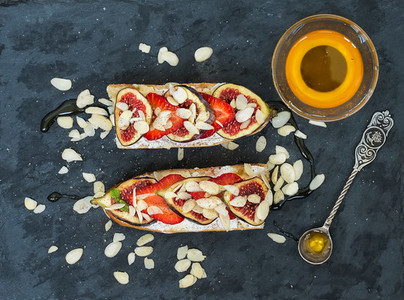 Fig and strawberry goat cheese sandwiches with honey