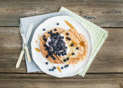 Dutch waffles with cream cheese  fresh blueberry and maple syrup
