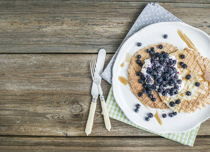 Dutch waffles with cream cheese  fresh blueberry and maple syrup