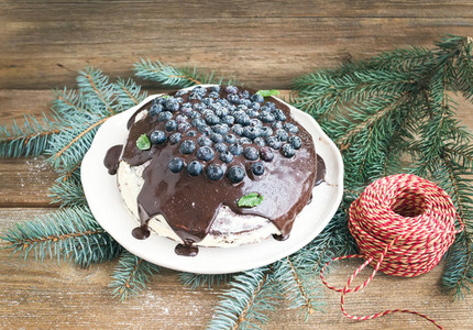 Christmas chocolate celebration cake with chocolate ganache  cre