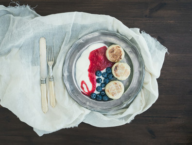 Breakfast set curd pancakes with yogurt fresh blueberry and ra