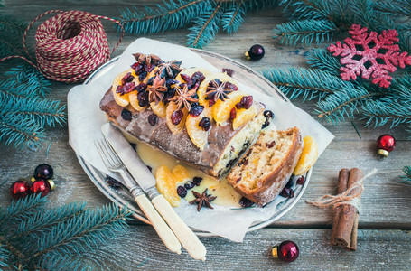 Christmas tangerine and cranberry spicy cake with holiday decora