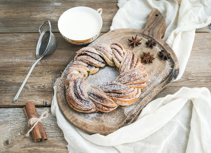 Village style breakfast set sweet cinnamon ring bread and a cup