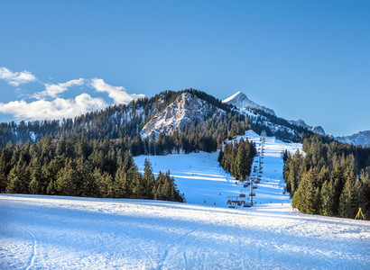 Mountain skiing slopes and ski lift at Hausberg top near Garmisc