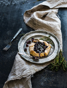 Homemade crusty pie or galette with blueberries