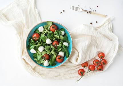 Spring salad with lambs lettuce mozzarella and cherry tomatoes