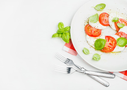 CLassic Italian Caprese salad with tomatoes  mozzarella di Buffala and fresh basil