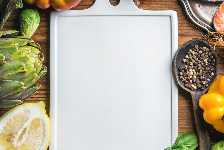 Dinner cooking ingredints. Raw uncooked salmon fish steaks with vegetables, rice, herbs, spices and wine