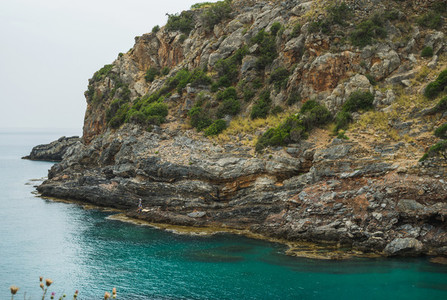 Turquoise sea bay with cliff in Turkey  Mediterranean region