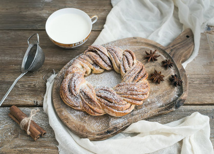 Village style breakfast set sweet cinnamon ring bread and a cup