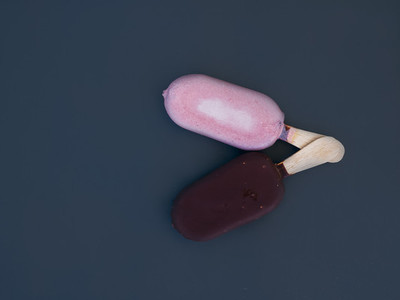 Two small ice creams on the dark