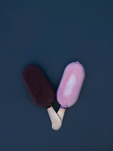 Two small ice creams on the dark