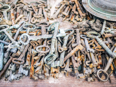 Antique rusty metal keys on a market stall at a flee market