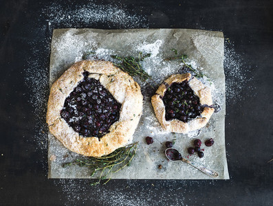 Homemade crusty blueberry pie or galette with ice cream