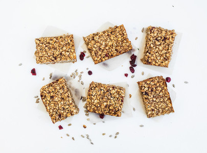 Granola bars on white background  top view