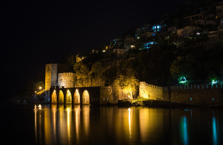 Night view of harbour fortress and ancient shipyard in Alanya Turkey