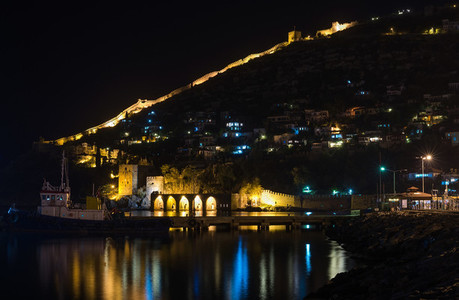 Night view of harbour  fortress and ancient shipyard in Alanya  Turkey
