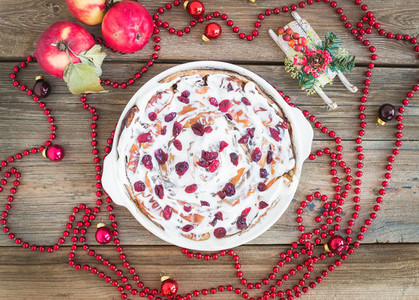 Apple  cranberry and cinnamon roll cake with creamy icing and Ch
