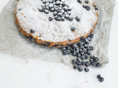 Blueberry pie on a white surface