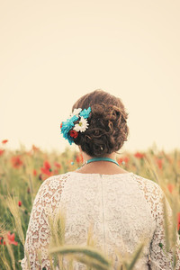 Bride on poppy field