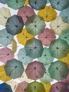 under umbrellas