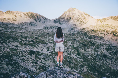 Girl hiking a mountain