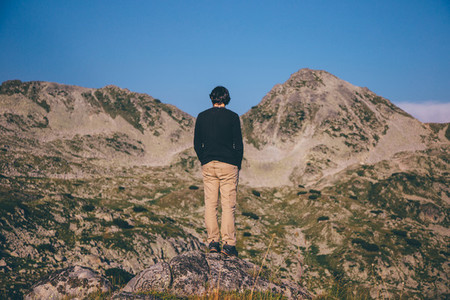 Young man hiking a mountain