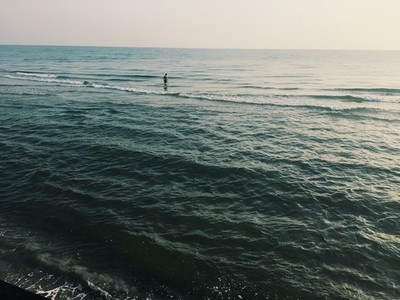 Man stands in the ocean