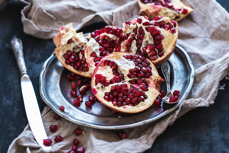 Red ripe peeled pomegranate