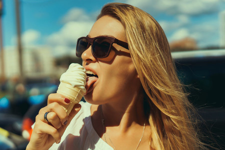 girl eats ice cream