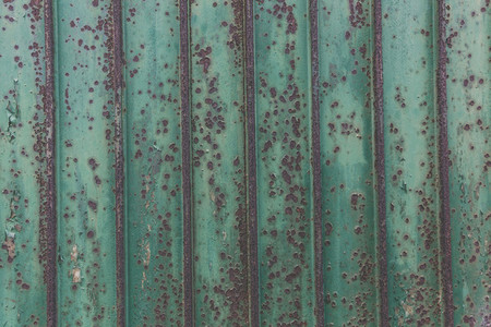 green rusty weathered garage doo