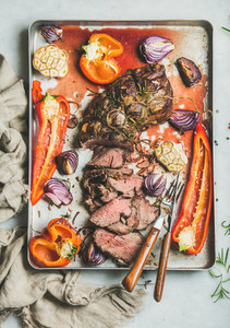 Cooked Roastbeef meat with grilled vegetables and herbs