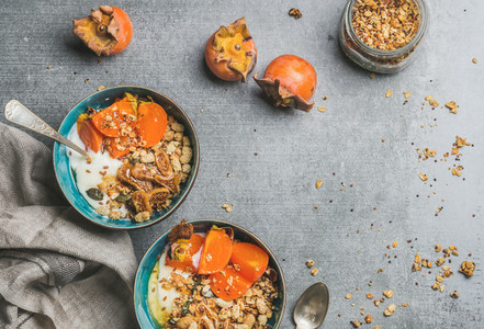 Healthy vegetarian breakfast in blue bowls copy space
