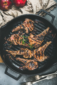 Barbecue dinner with grilled lamb meat chops in pan