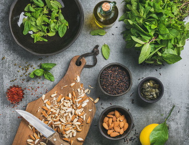 Healthy  vegan  clean eating cooking ingredients over grey background
