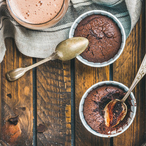 Chocolate souffle in baking cups and mocha coffee  square crop