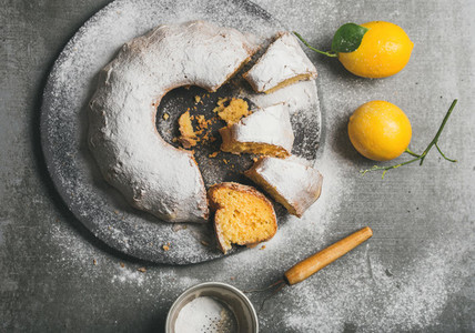 Homemade gluten free lemon bundt cake with sugar powder  top view