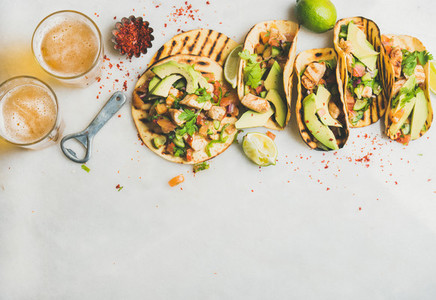 Healthy corn tortillas with grilled chicken  avocado  lime  beer