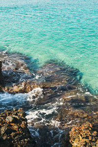 Natural rocks and clear blue waters at Kleopatra beach  Alanya
