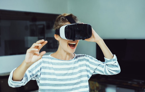 woman using VR glasses