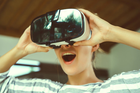 woman using VR glasses