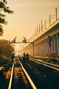 Peoples crossing a railroad