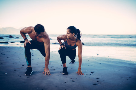 Sporty fitness couple exercising