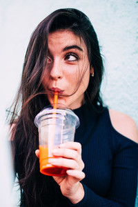 woman drinking healthy juice