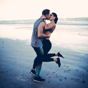 Fitness couple kissing